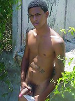 Latino guy jacking in an abandoned and rotted room