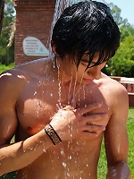 Wet twinks brandishing their hard-ons in the sun